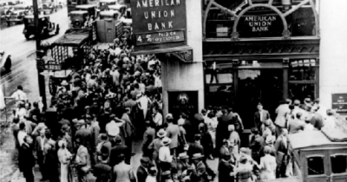 Crowd at New York's American Union Bank during a bank run early in the Great Depression.