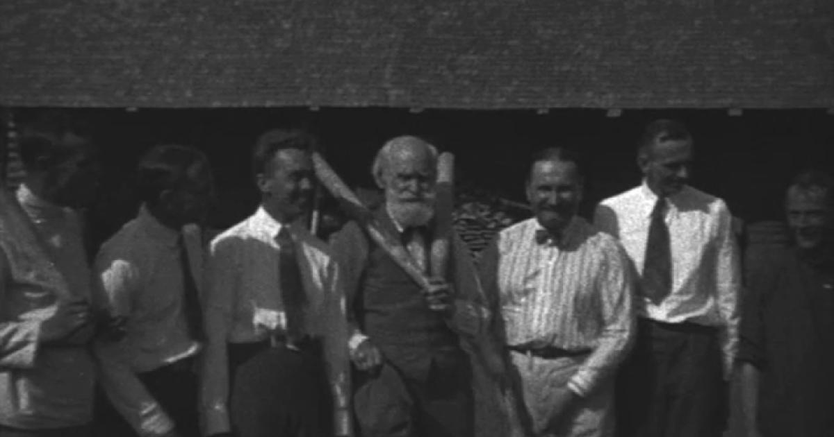 Ivan Pavlov and associates posing for the camera during a brief pause from their game of gorodki.