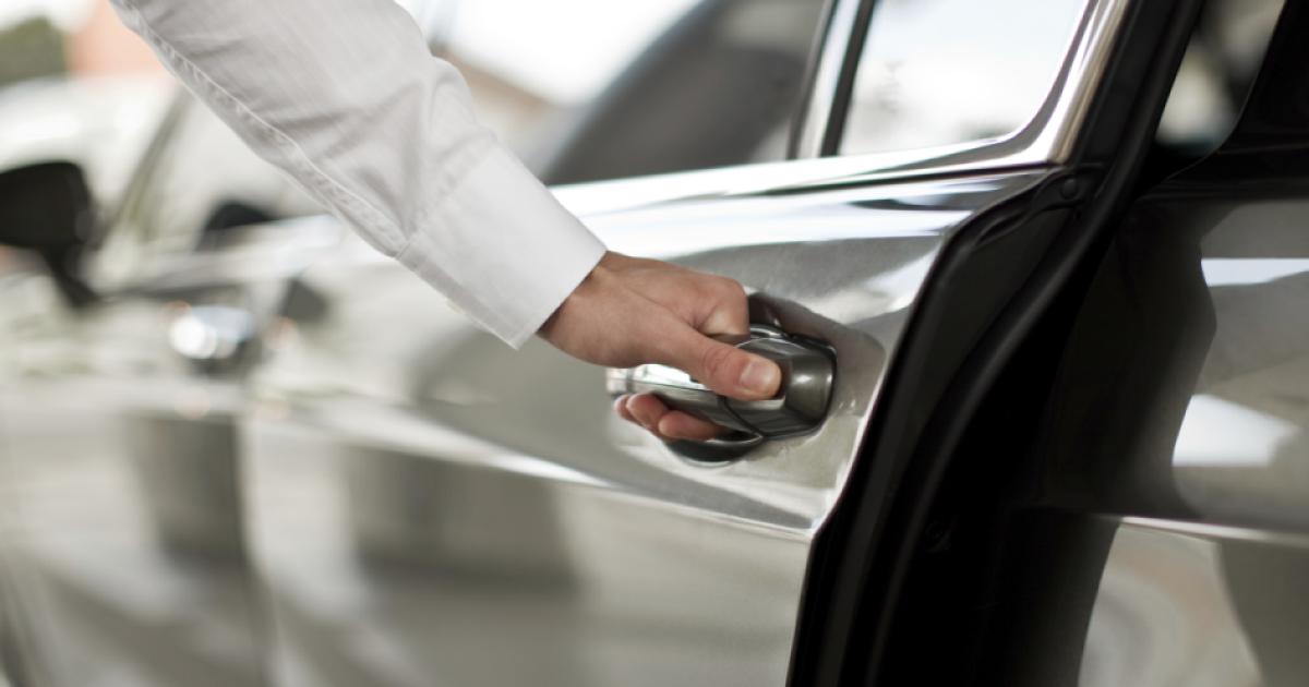 Man opening a car door