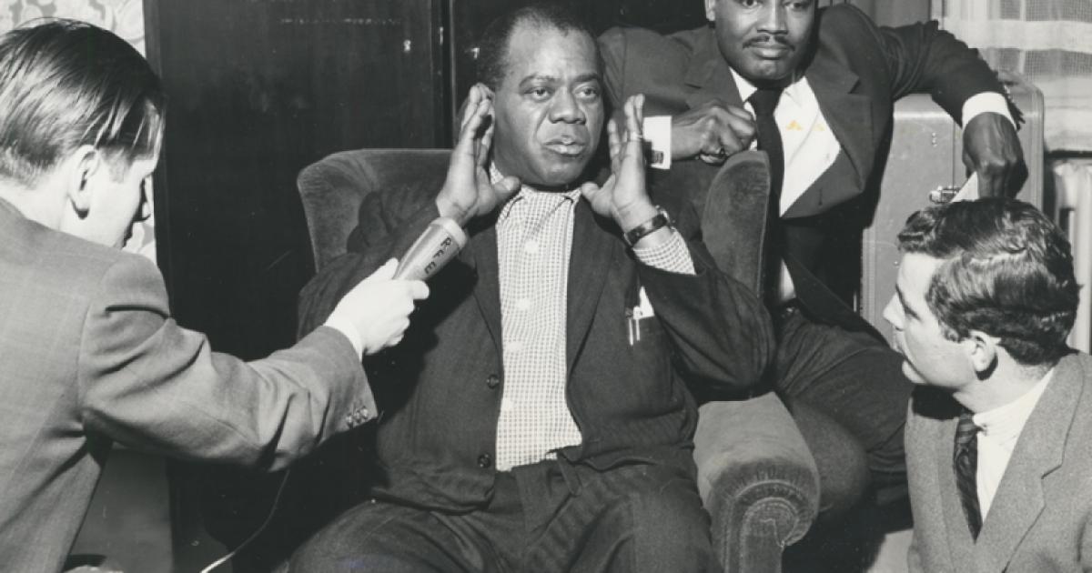 Louis Armstrong visits with Radio Liberty reporters