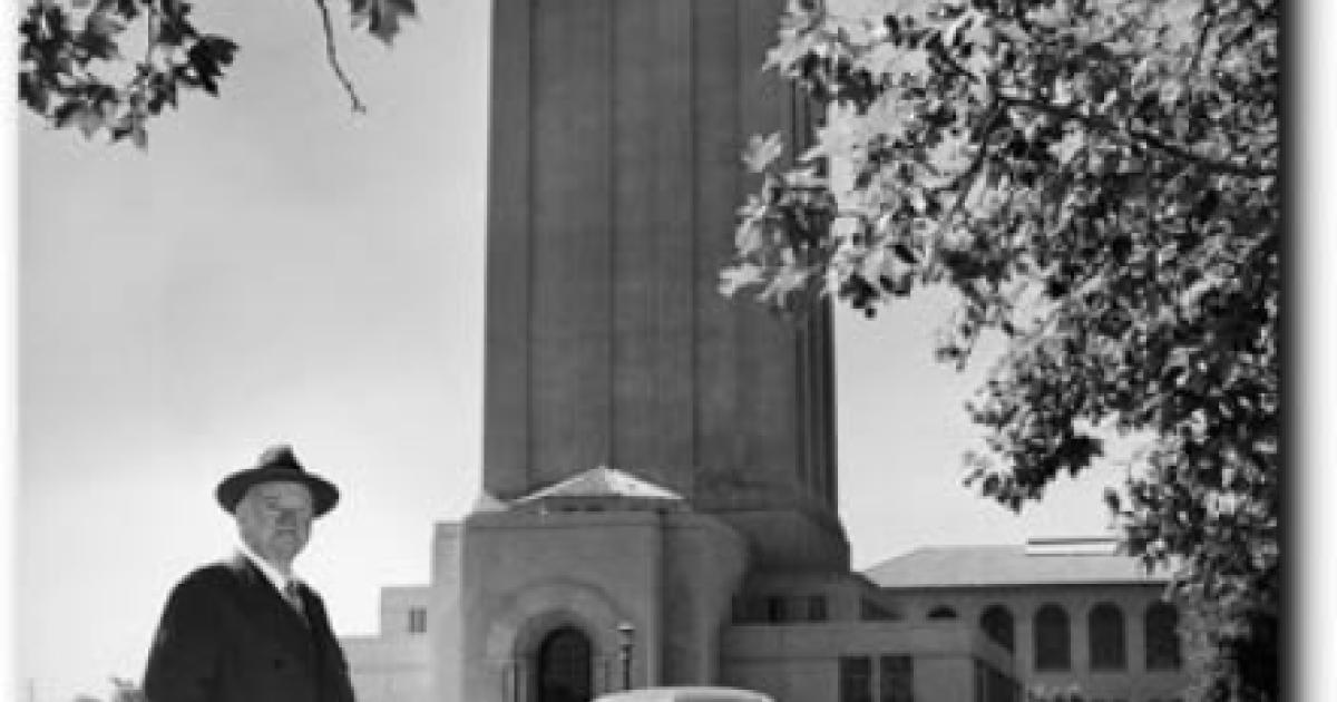 Former president Herbert Hoover poses with his namesake tower in August 1951.