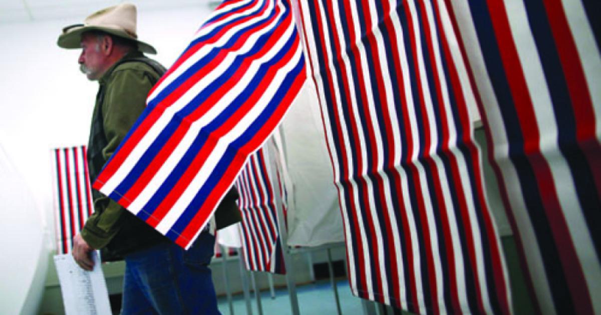 man leaves voting booth