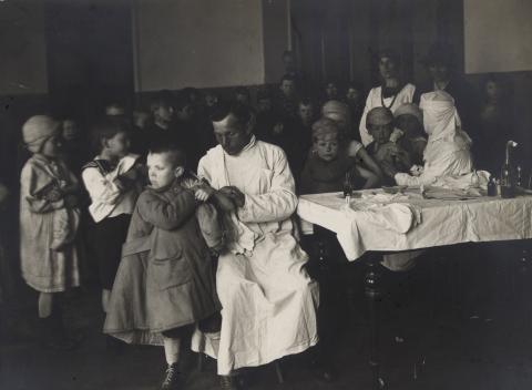 Black and white photograph of a vaccination clinic run by the ARA Russian Unit's medical program, circa 1922