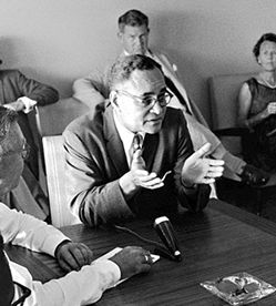 Ralph Bunche, U.N. undersecretary for special political affairs, holds a press conference in Leopoldville, Republic of the Congo, January 1963.