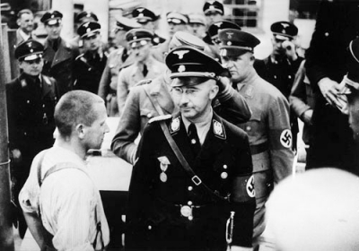 Himmler on an official visit to Dachau, 1936.